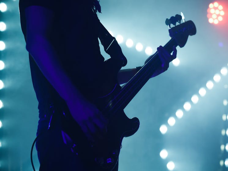 Person playing guitar