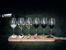 Indulge in a food and wine matching experience - six premium wines with six bites of regional food