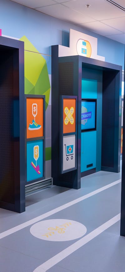 Touchscreens displaying the DemocraCity game