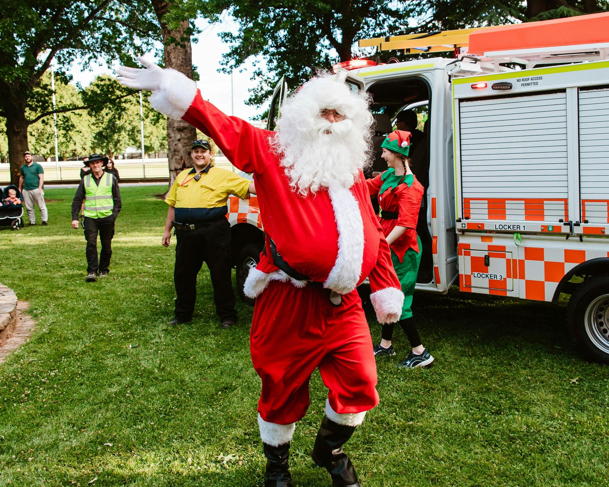 Santa waving in front of SES truck