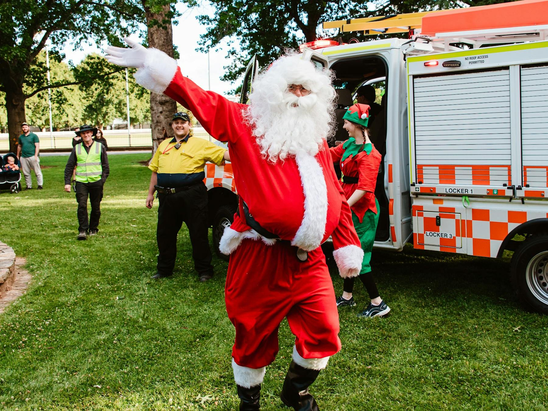Santa waving in front of SES truck