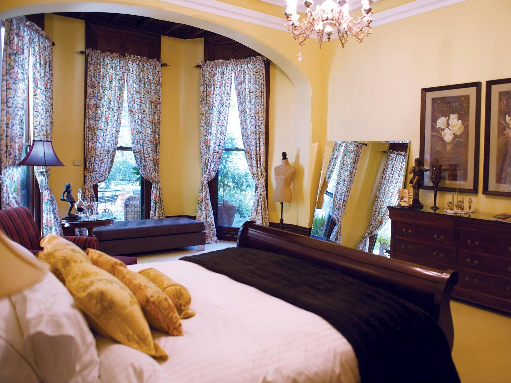 Grand Botannica room with superking bed dressed with luxurious linen overlooking the parkland garden
