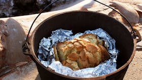 Watch the distant domes of Kata Tjuta come into view and enjoy a traditional Aussie breakfast.