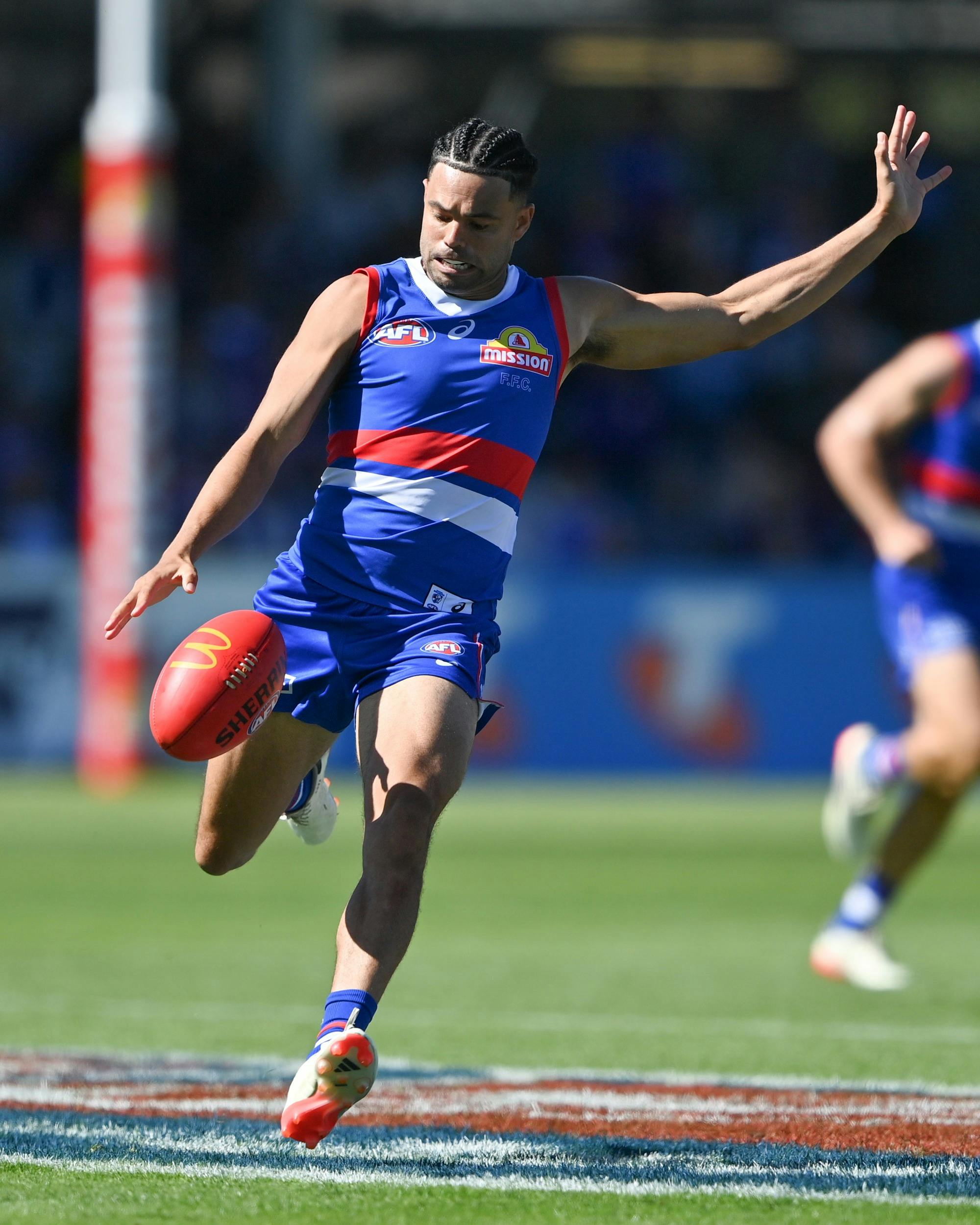 Football player kicking the ball