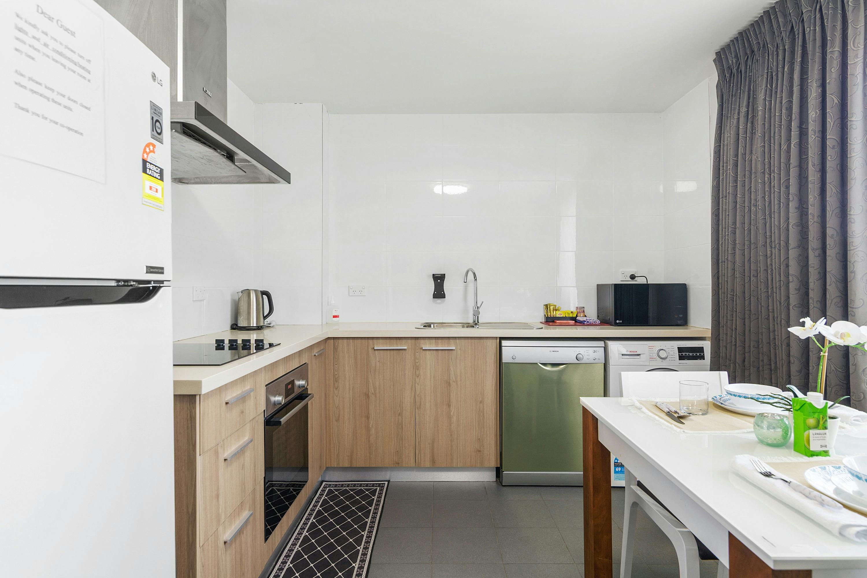 Kitchen & Laundry in Self-Contained Studio Apartment