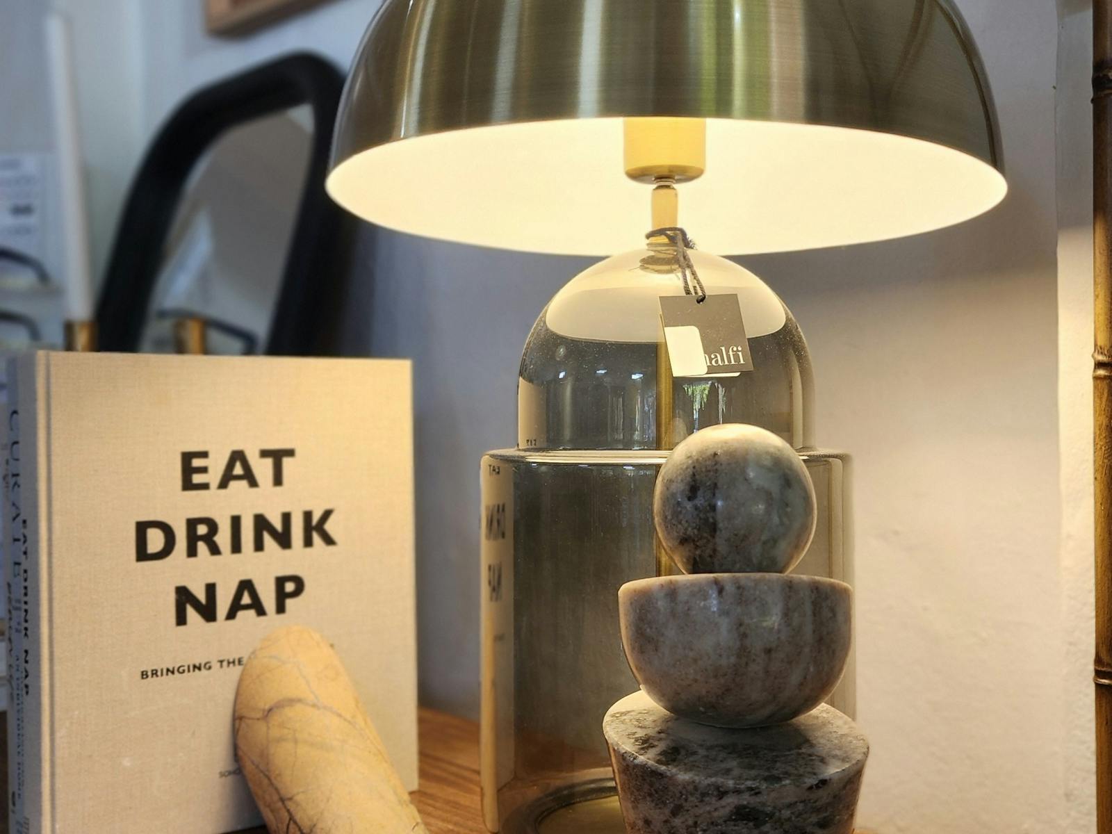 Eat Drink Nap book, with ceramic display and lamp