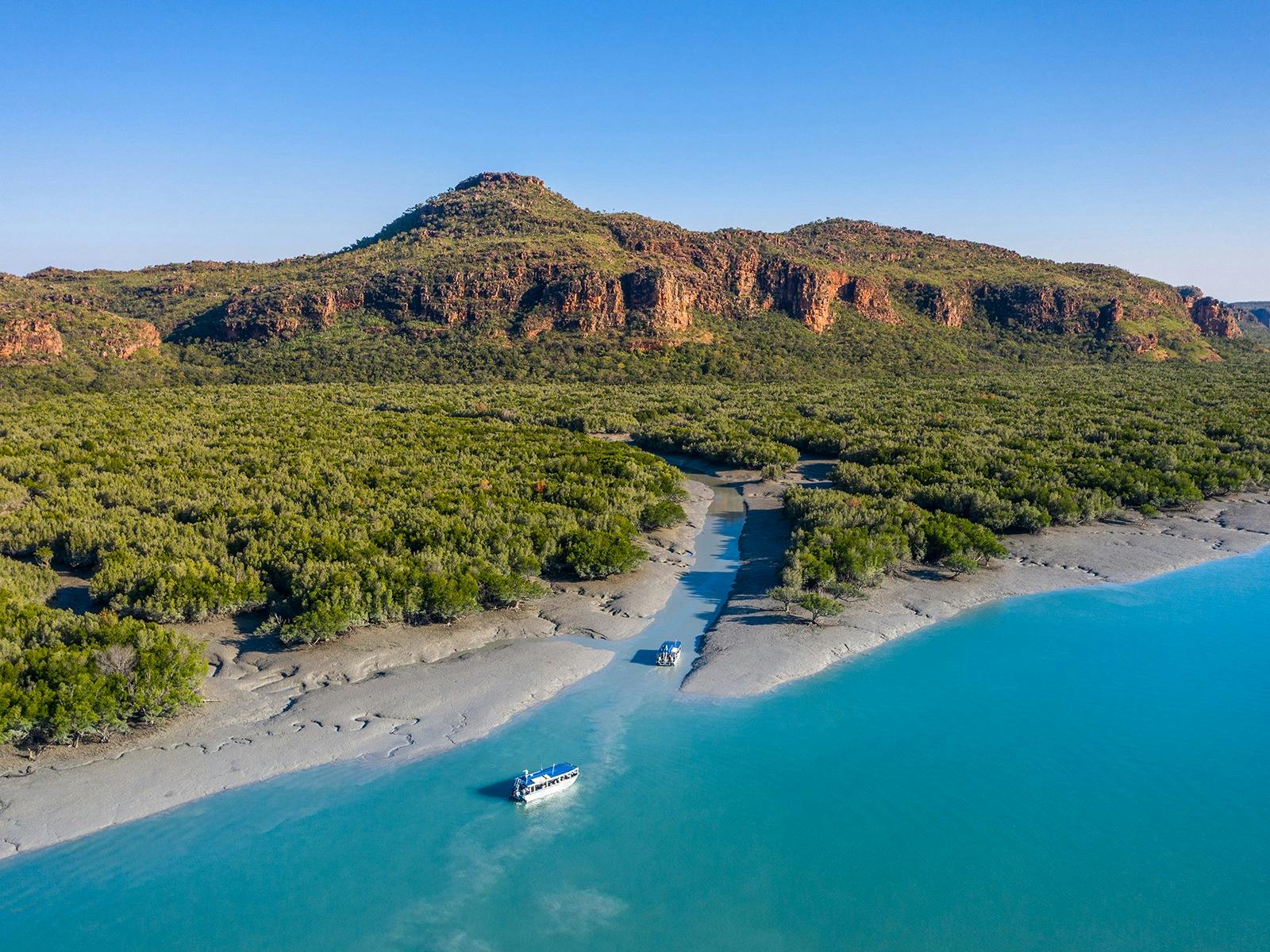 Xplroer Cruising Down Porosus Creek