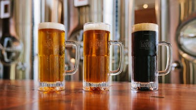 three beers on a bar at Lager House Canberra