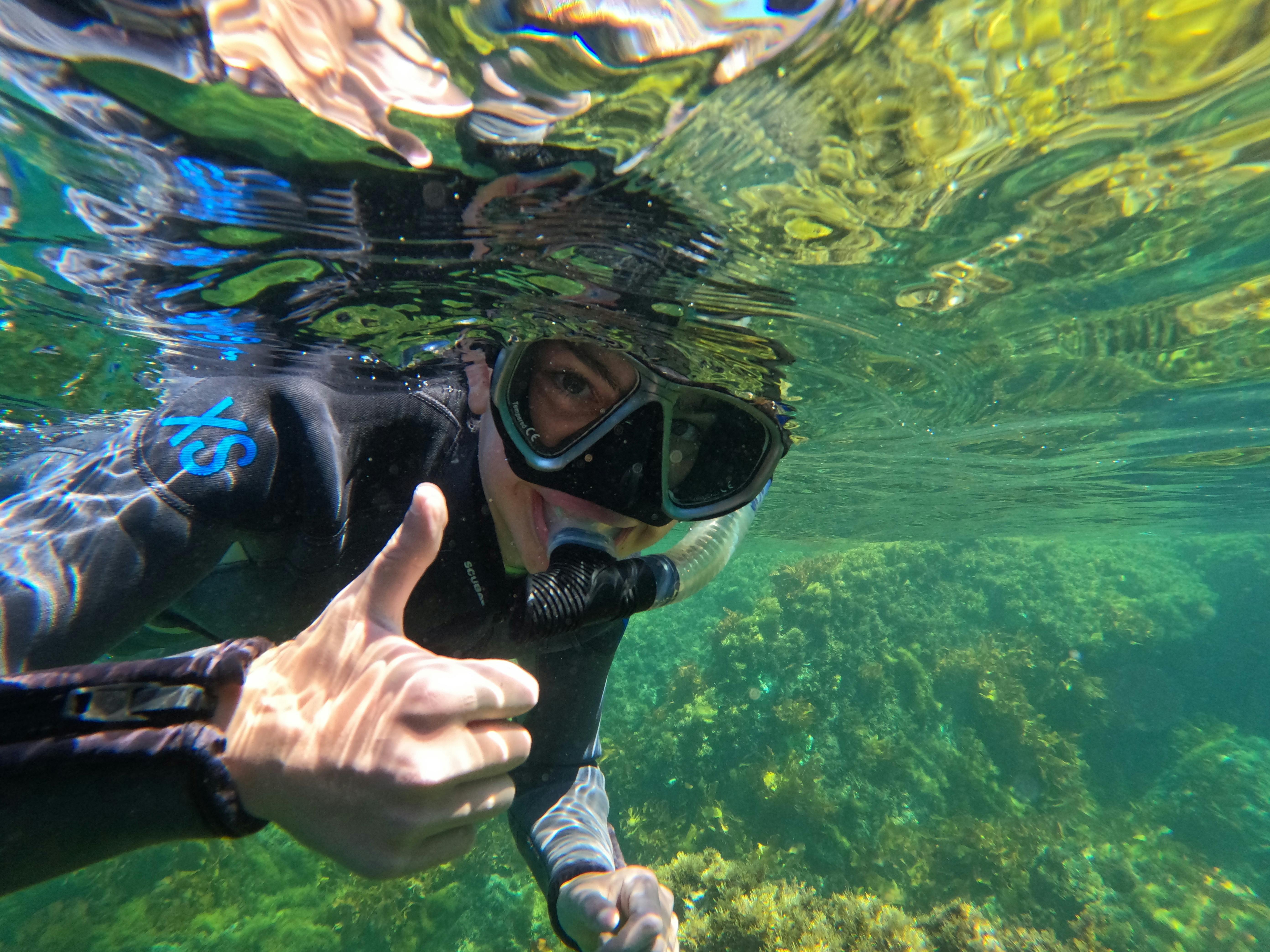 Happy Snorkeler  close with thumbs up signal