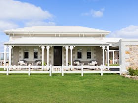 A traditional stone historic home metres from the beach with stunning views and luxury amenities