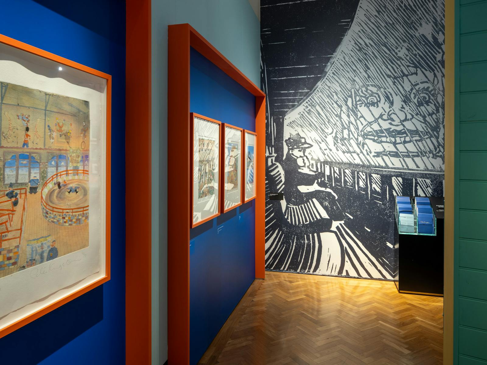 Exhibition with colourful art and wall decals