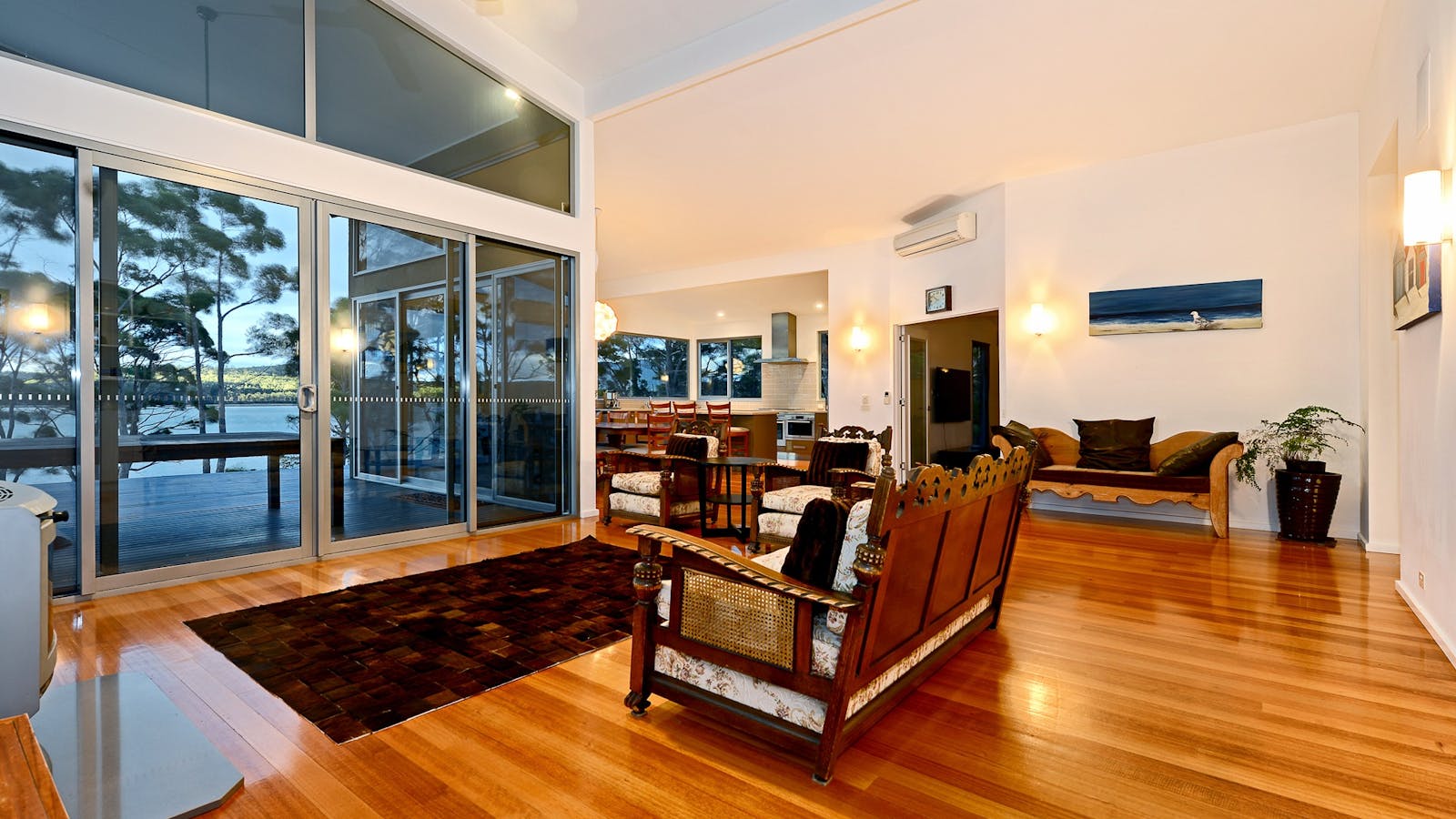Cloudy Bay Lagoon Estate: lounge area looking out onto deck and Cloudy Bay Lagoon.