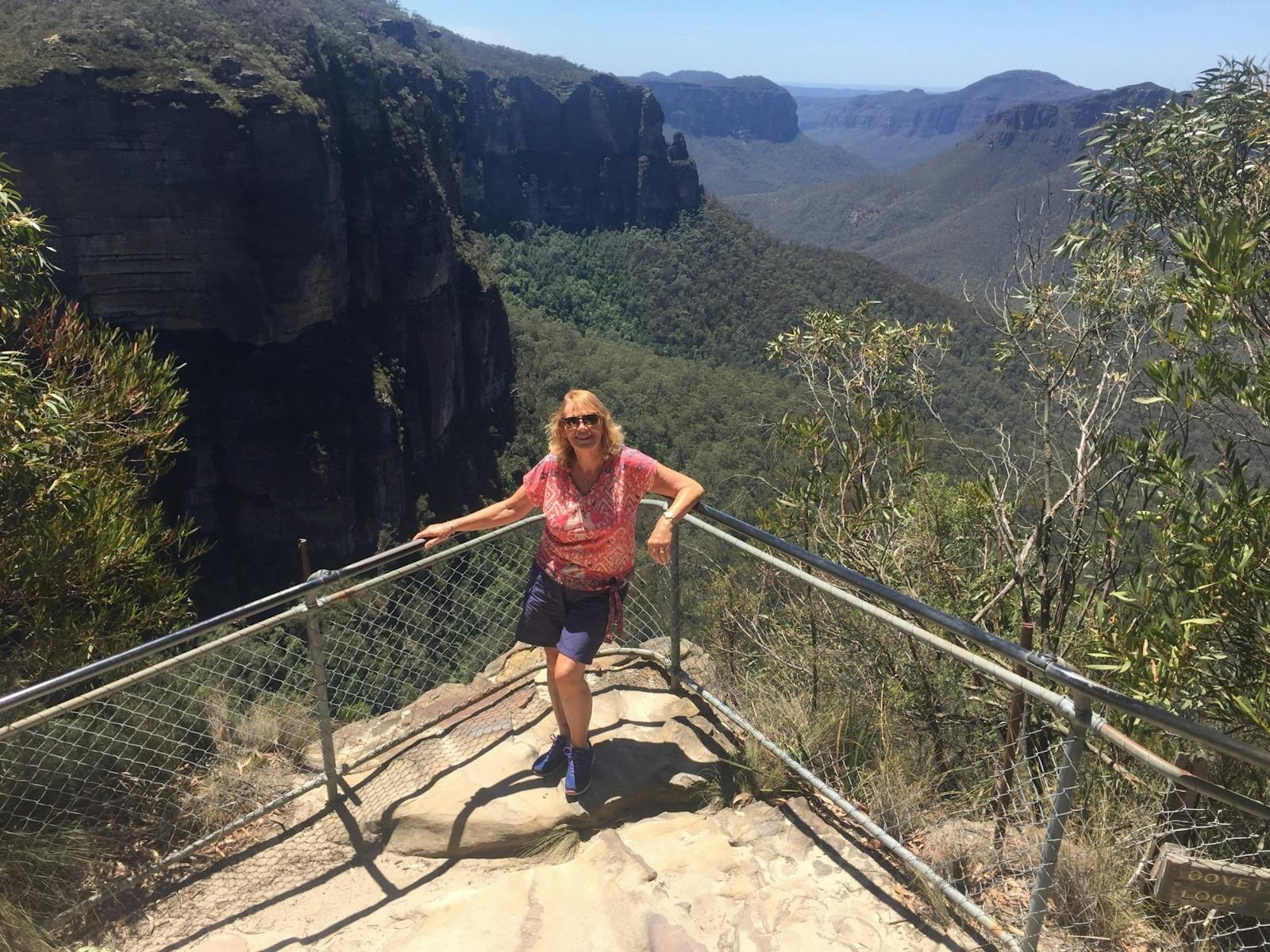 Lady standing at a scenic lookout at Federal Pass