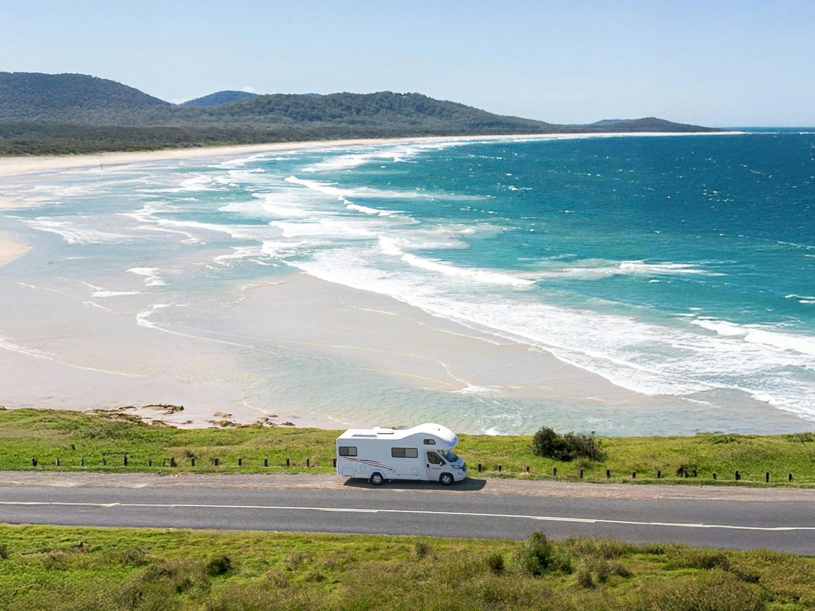 Vehicle parked with magnificent beach views