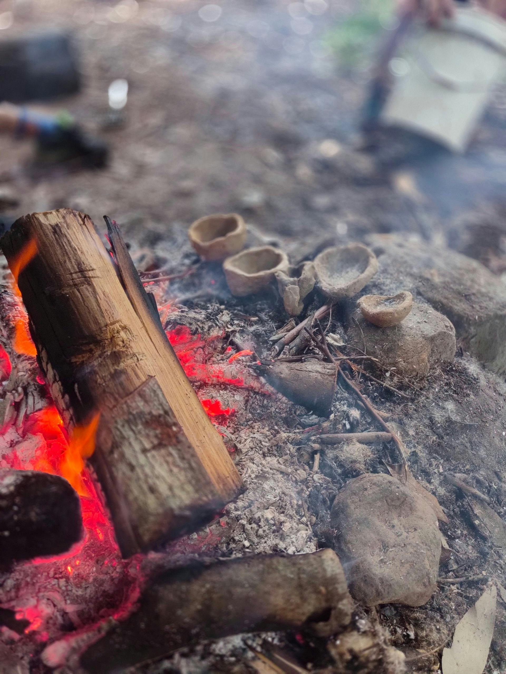 The warmth of a campfire and making pottery
