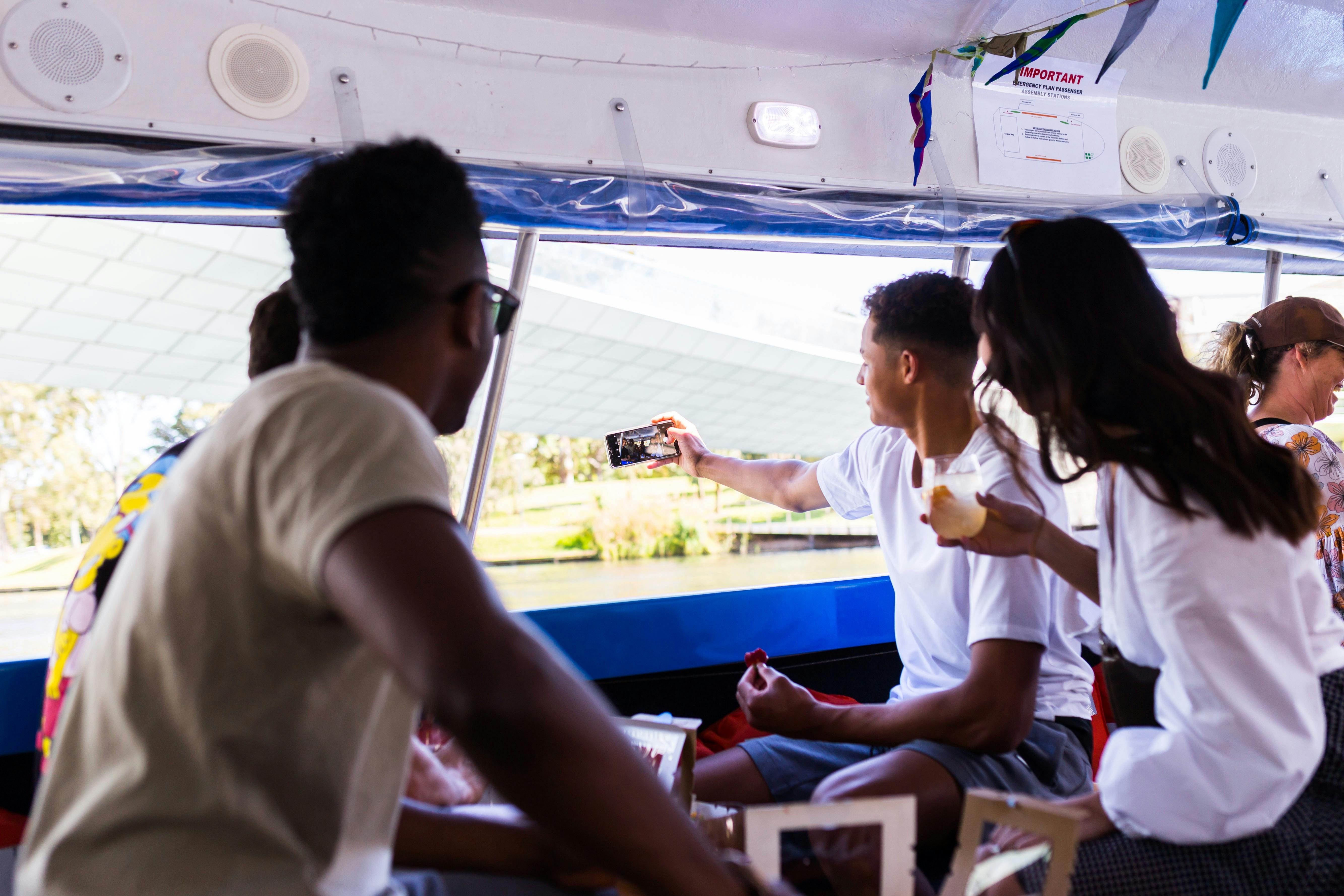Passengers taking a selfie aboard The Popeye