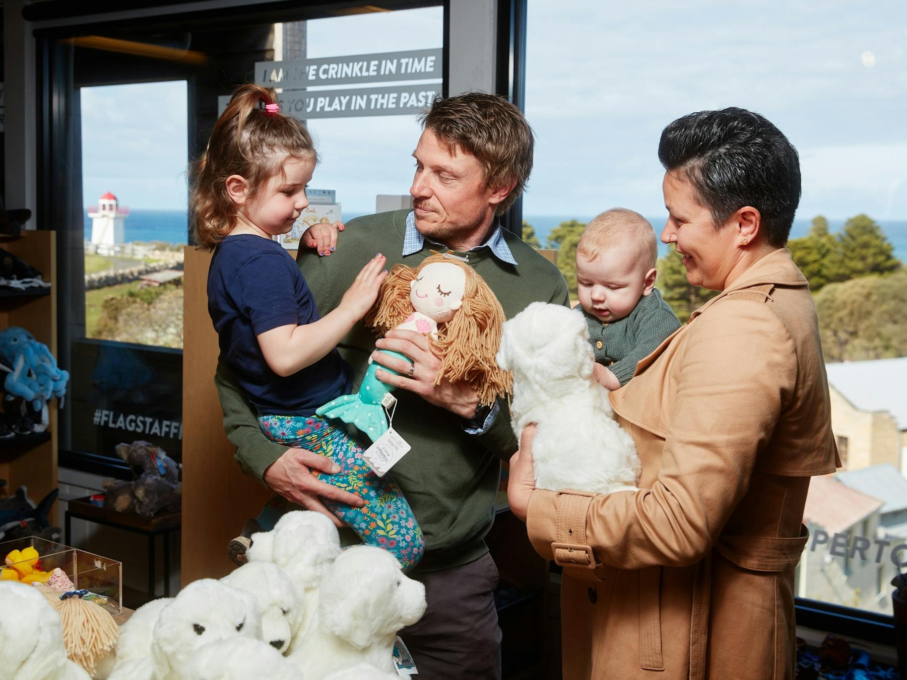 Family looking at plush toys