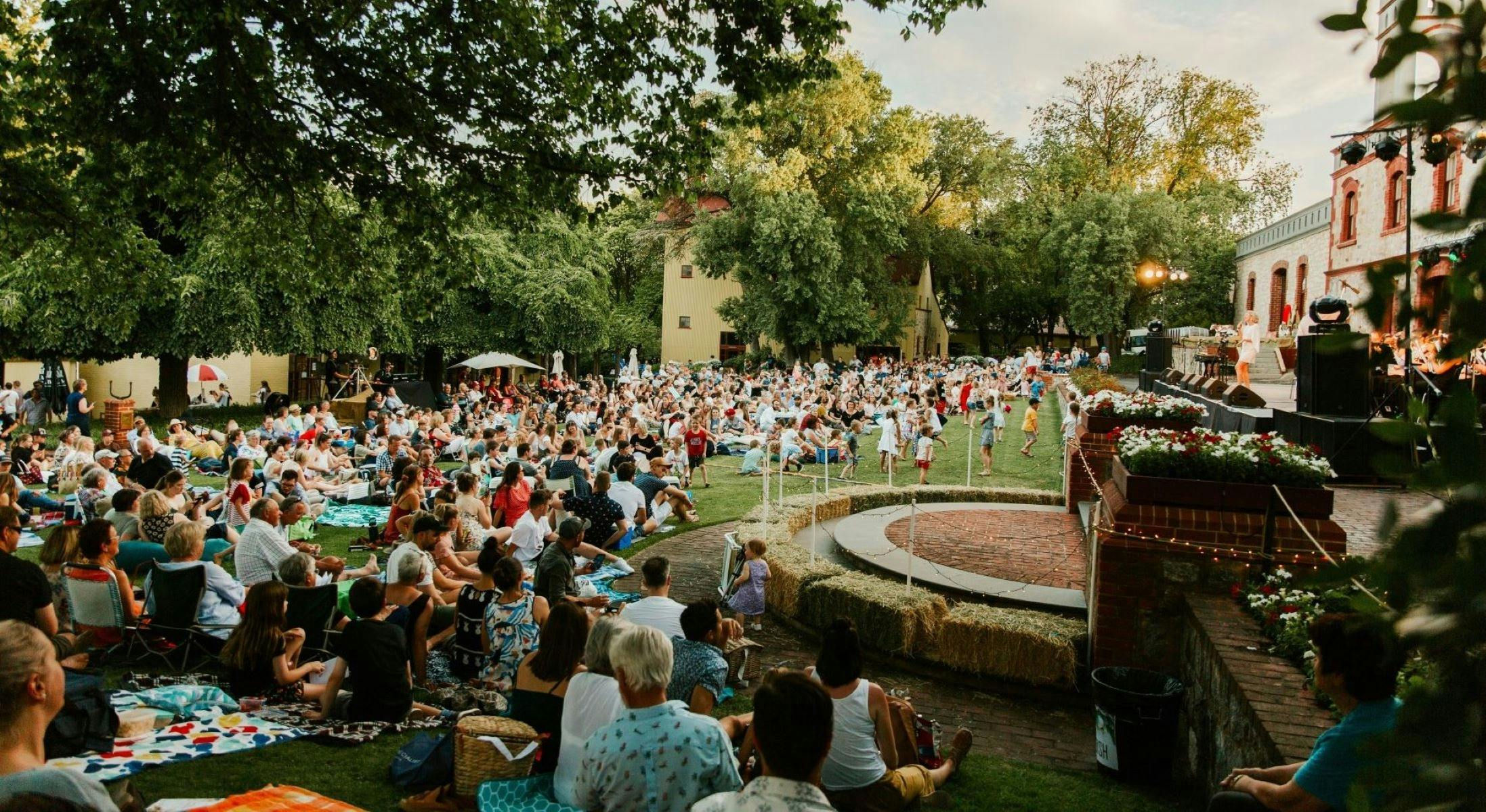 Yalumba Clocktower for Yalumba Christmas Carols with the lawns filled with people