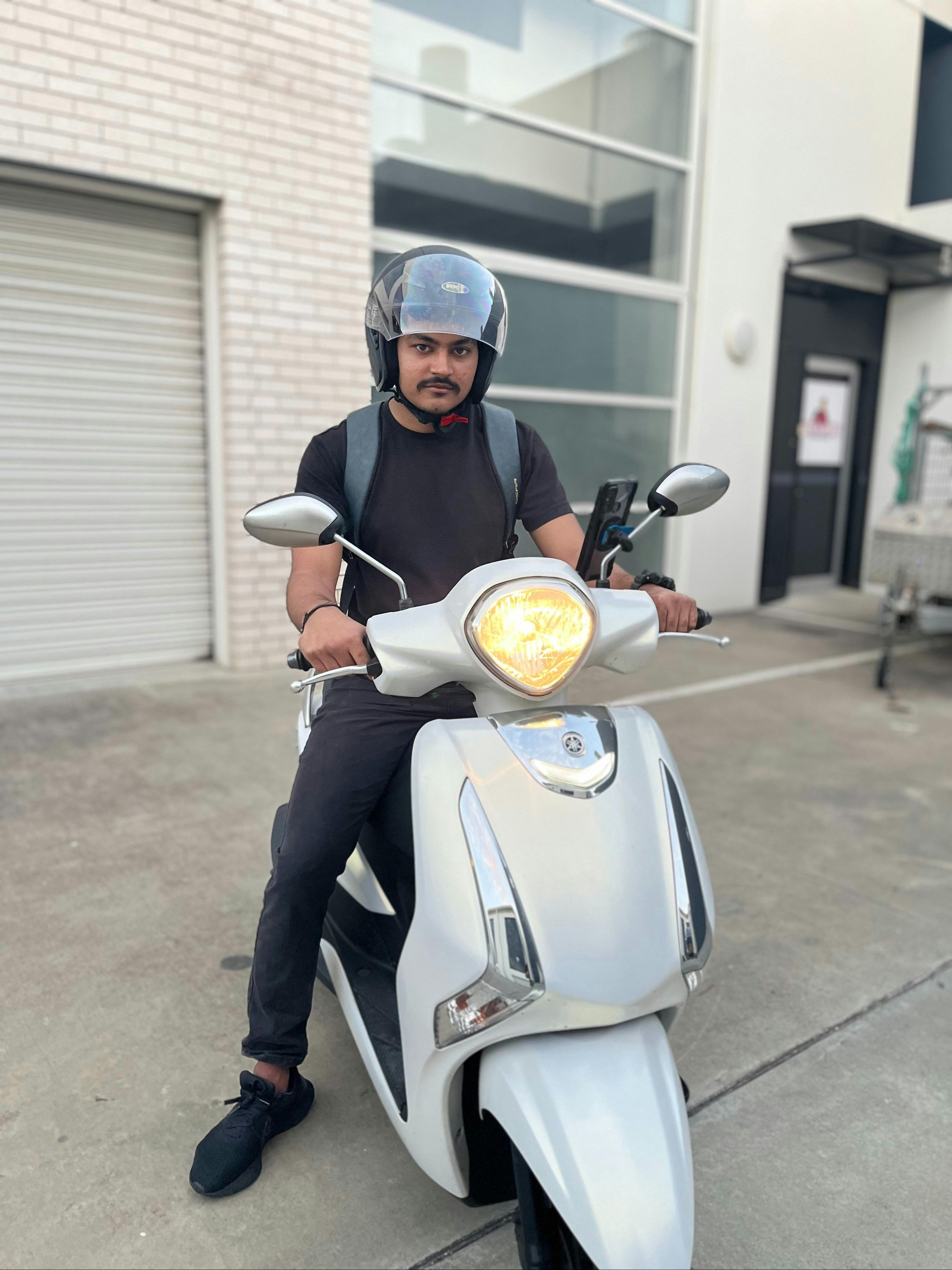 Customer renting scooter with Motion Rental