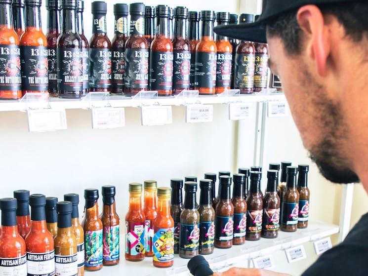 Taste over 100 hot sauces in store