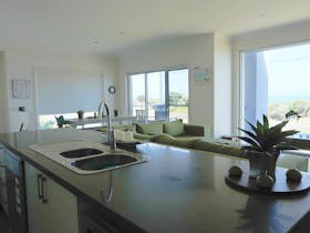 OPEN PLAN LIVING AREA, GOURMET KITCHEN WITH COFFEE MACHINE