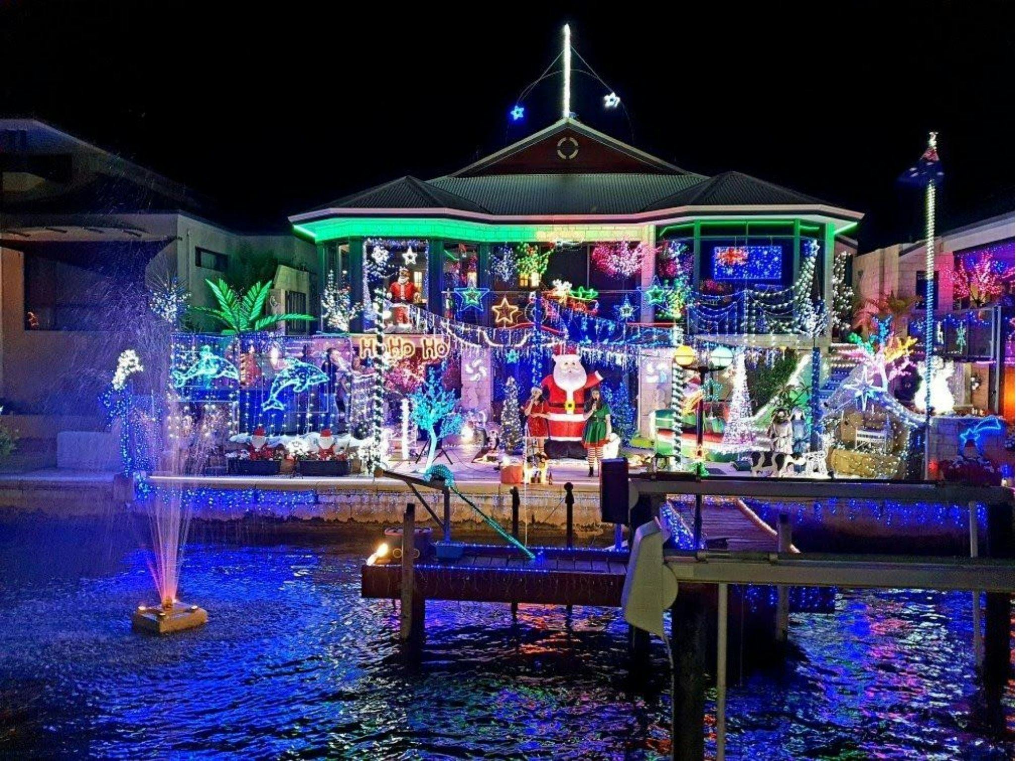 Canal residents house displayed with Christmas lights