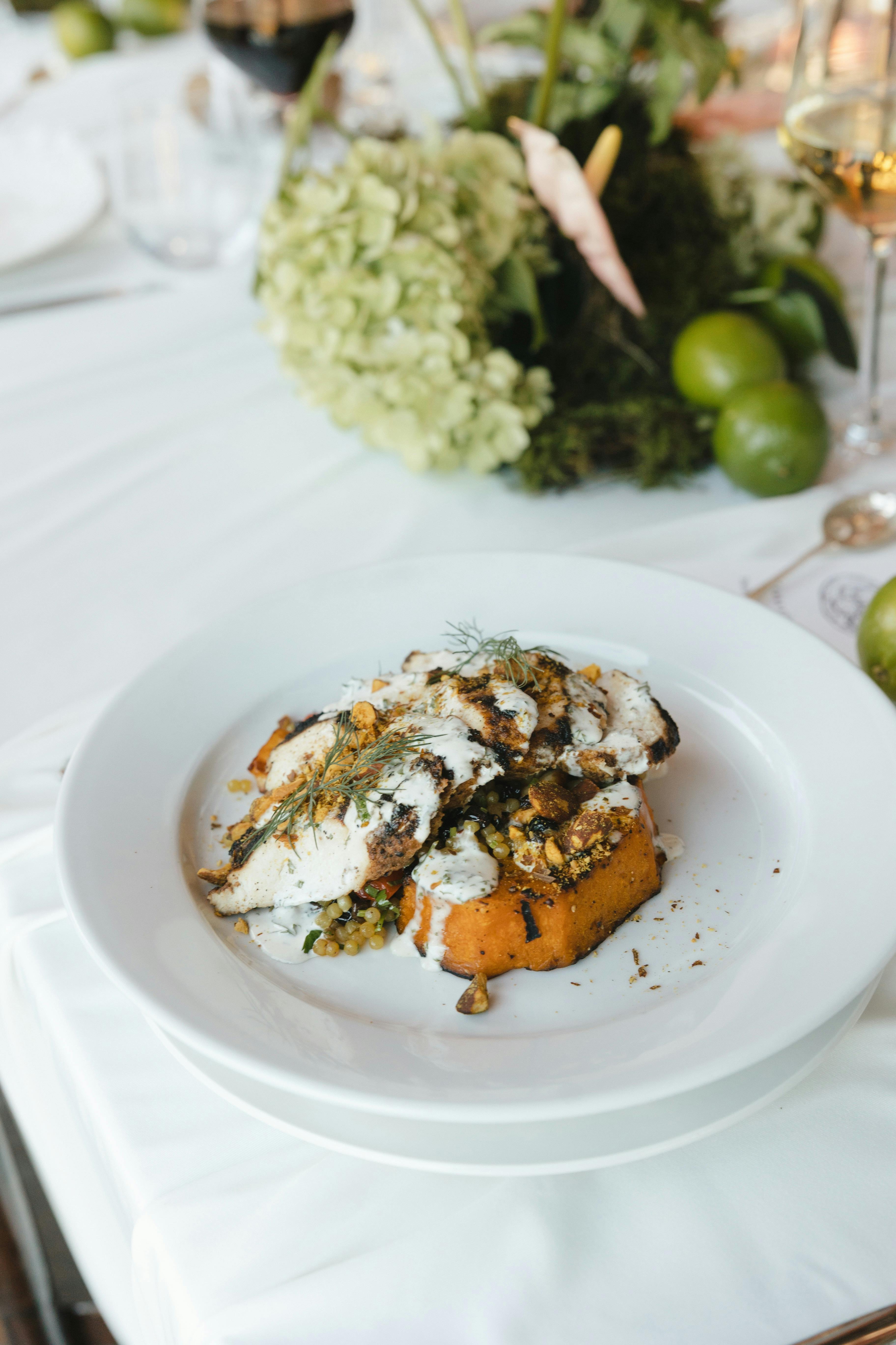Lebanese Charred Chicken, roasted pumpkin, haloumi, capsicum, herbs, cous cous, ranch & almonds