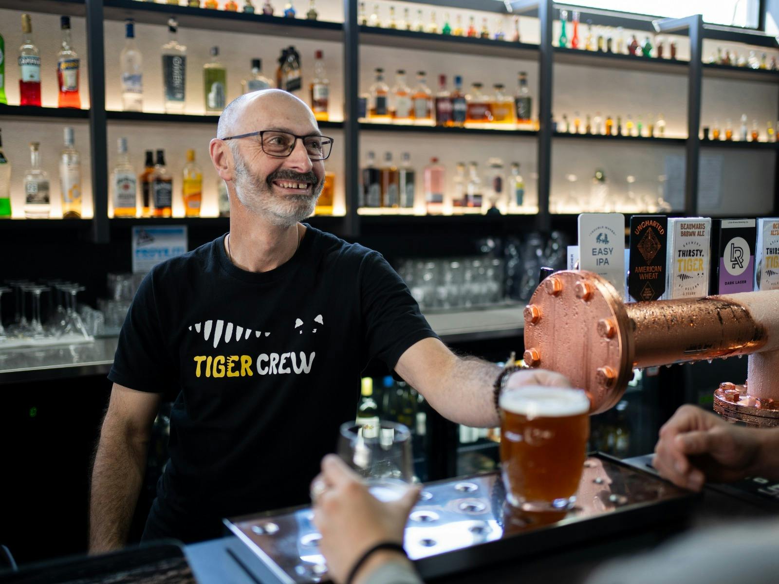 Fully licensed Easy Tiger Cinema bar in St Helens serving a customer before a film