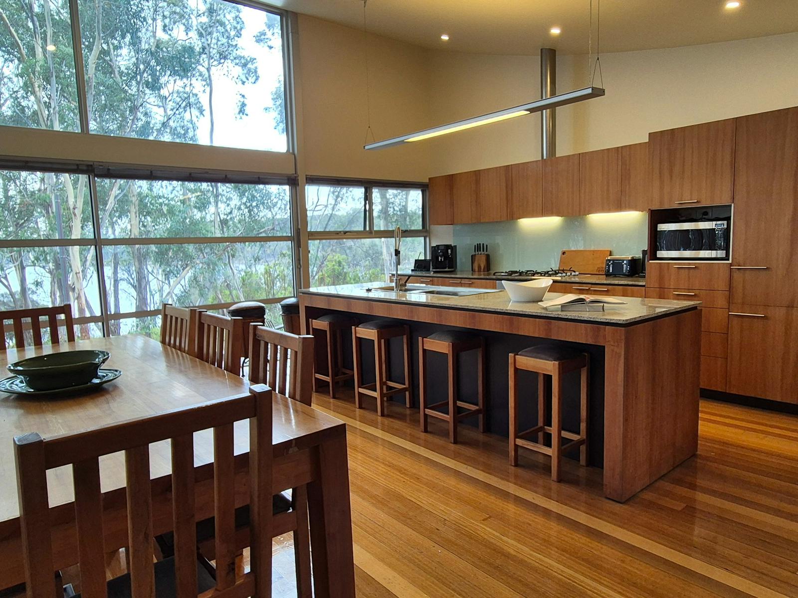 Kitchen with dining table and views
