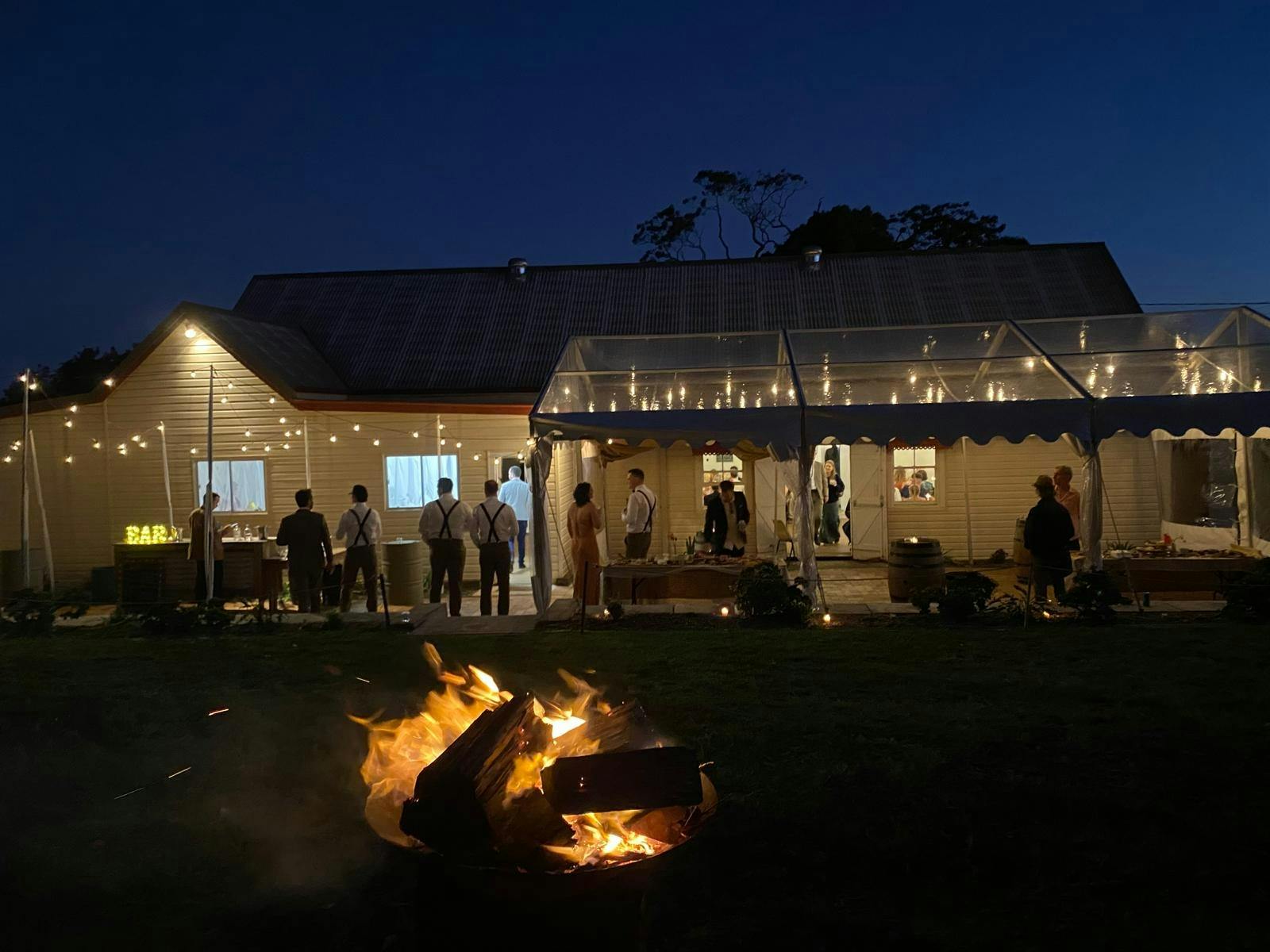 Guests attending an event at Eureka Hall at night