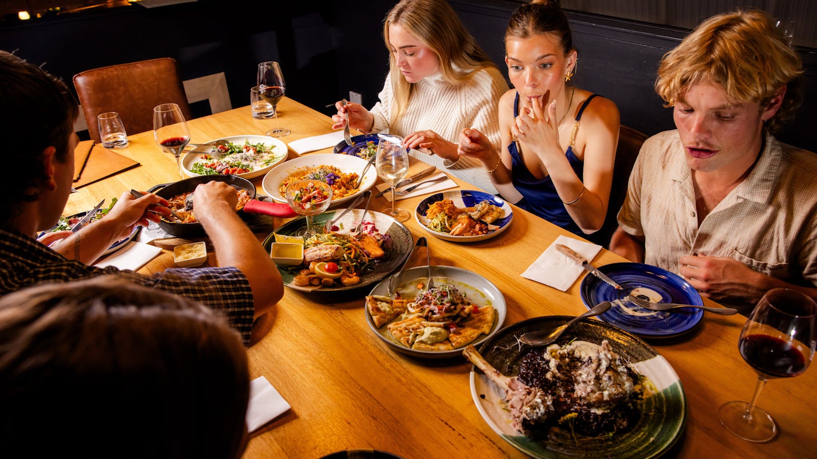 A feast of traditional Greek dishes made with Tasmanian produce, shared among friends.