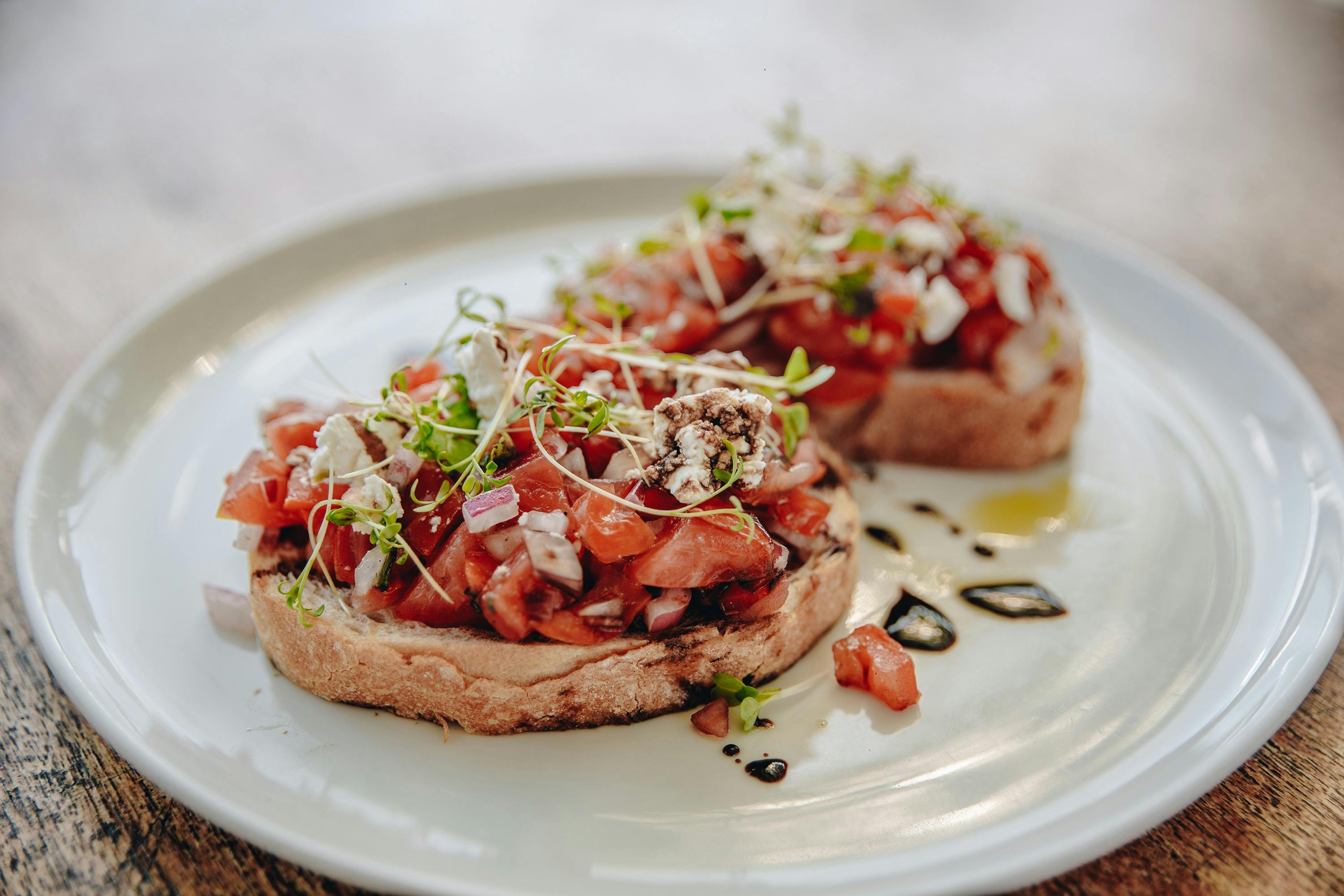 Tomato Bruschetta | garlic sourdough | goats cheese | caramelised balsamic