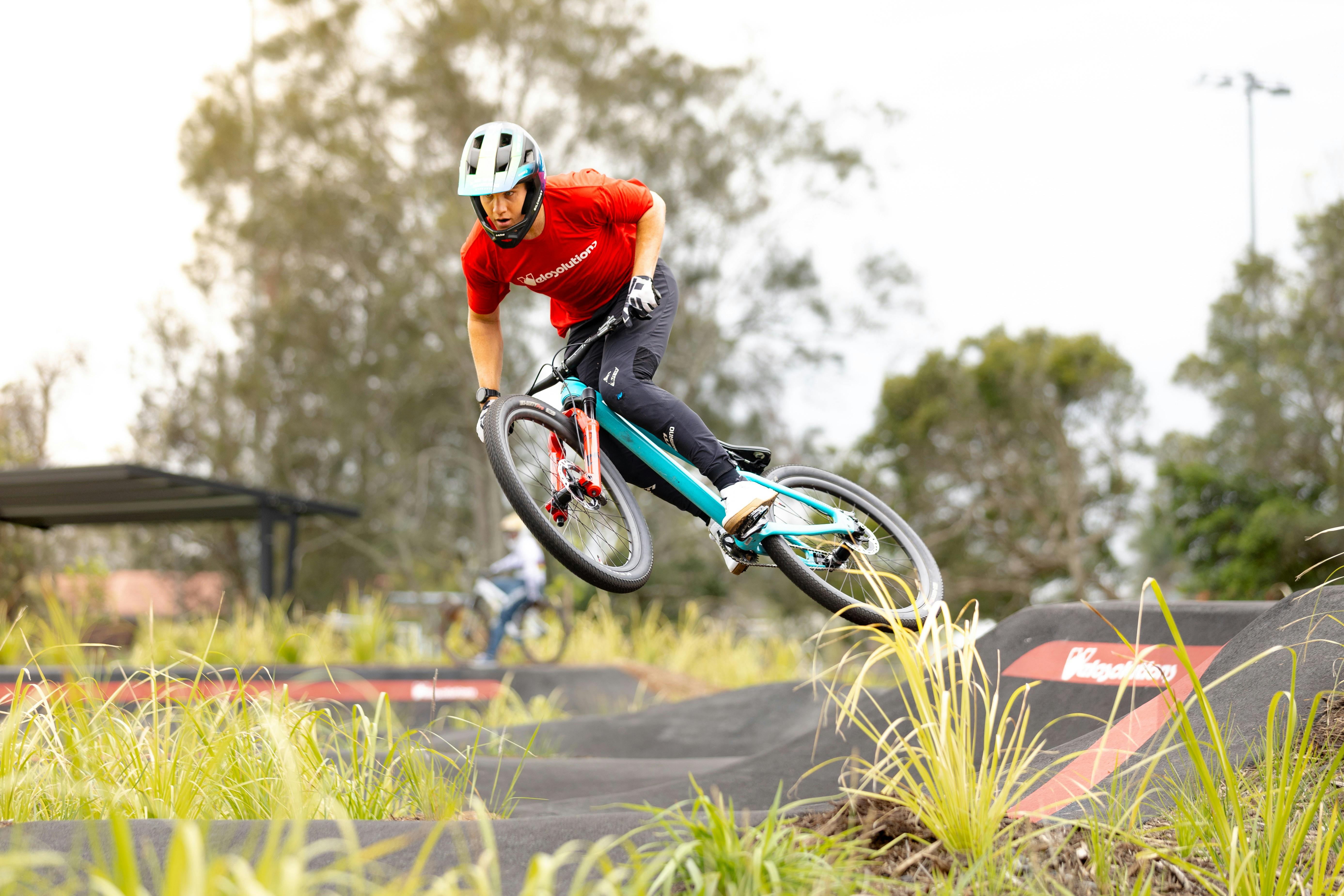 biker on the pump track