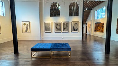 gallery with installed lino prints by GW Bot