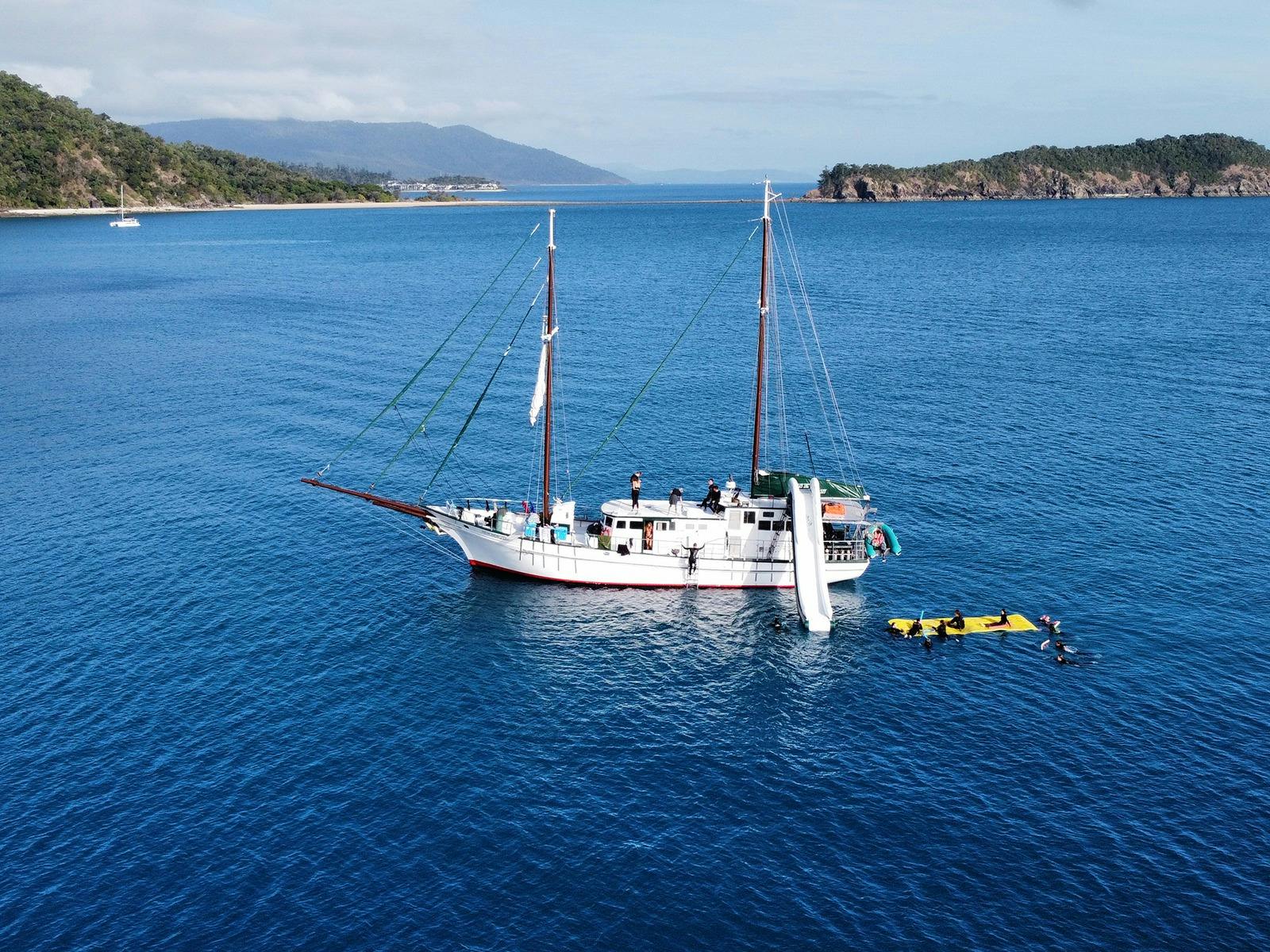 New Horizon with waterslide out and calm blue waters New Horizon with waterslide out and calm blue waters