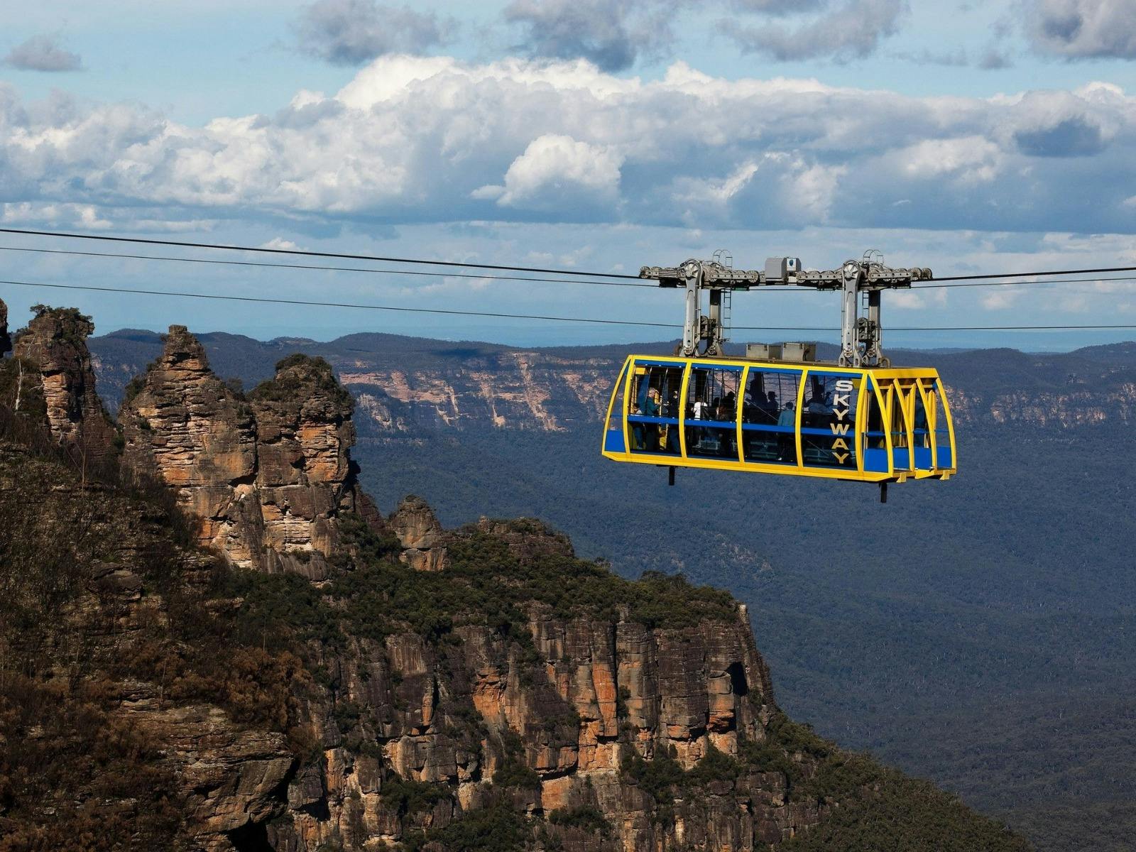 scenic world sky way carriage hanging from cable spanning the katoomba falls valley