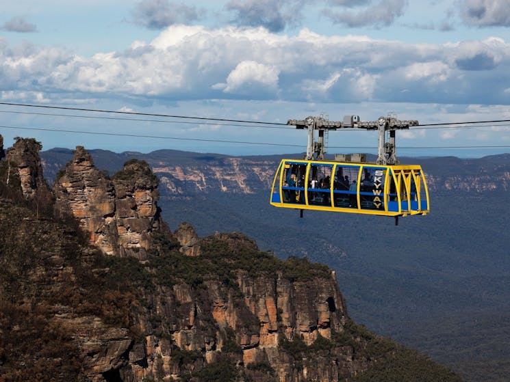 scenic world sky way carriage hanging from cable spanning the katoomba falls valley