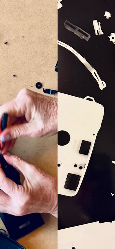 An image of hands pulling apart a camera and a black and white photogram