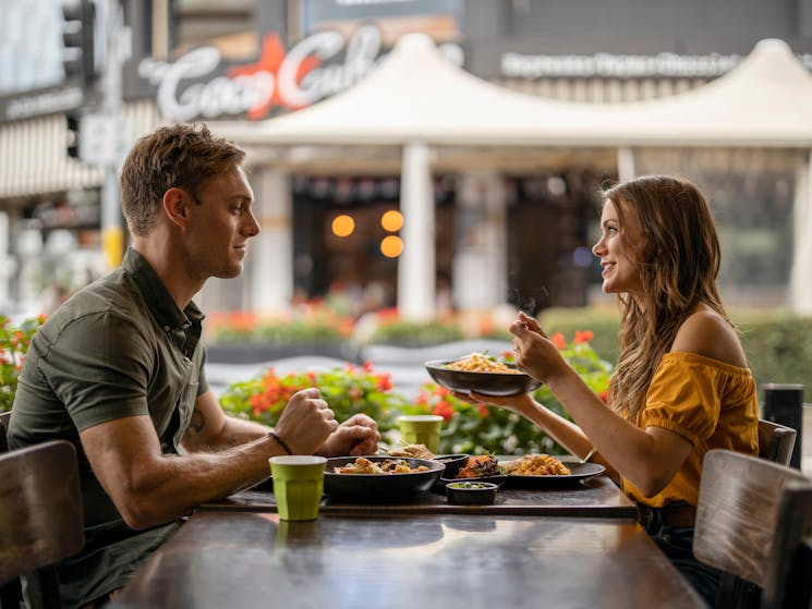 Couple enjoying food and drink at Thai La-Ong, Parramatta in Sydney's west