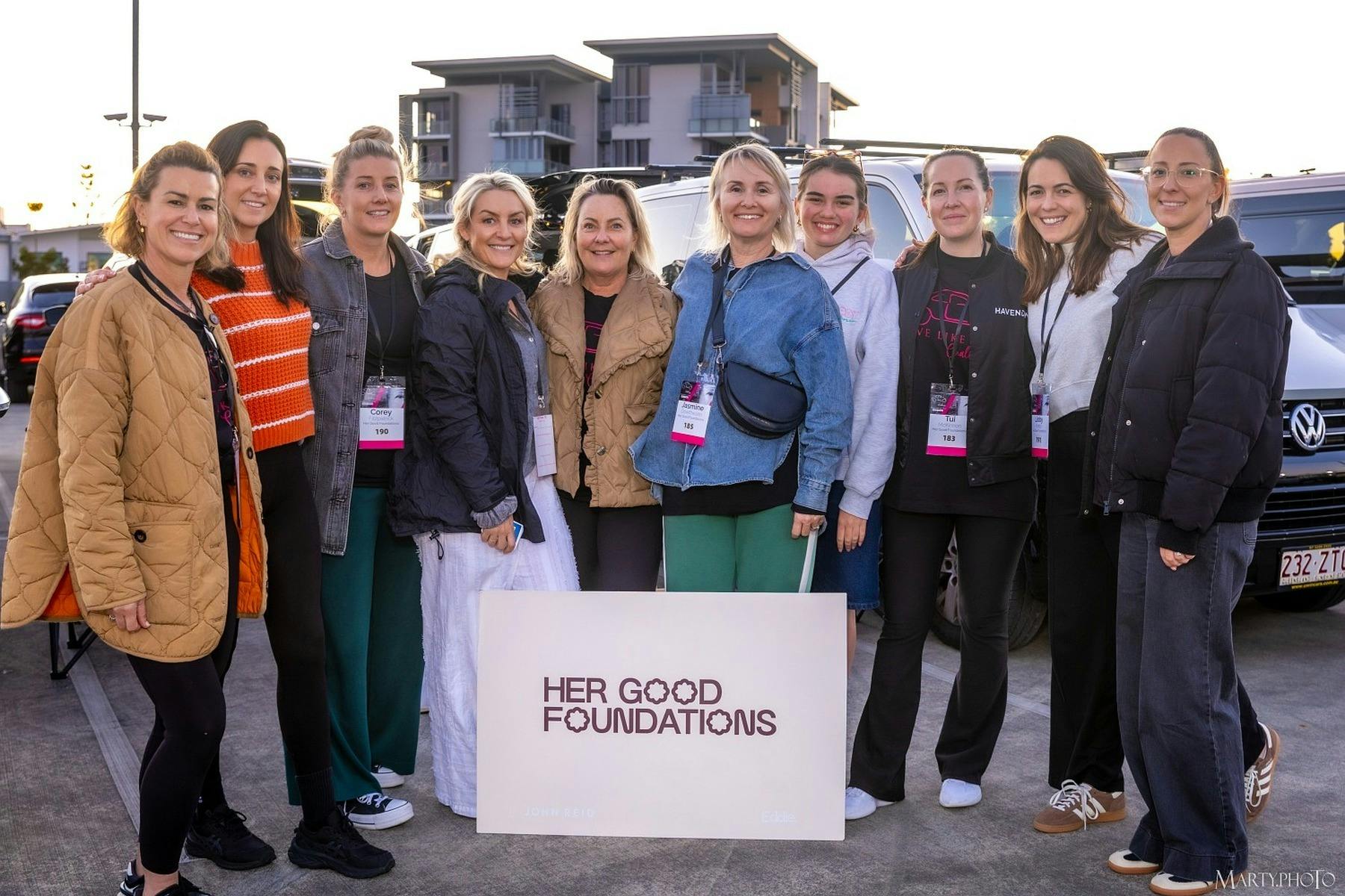 Group of women standing together at the Gold Coast Live Like Her Challenge with a Her Good Foundatio