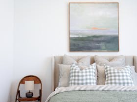 Queen bed, linen Robe, Grampian Goods Co lotion