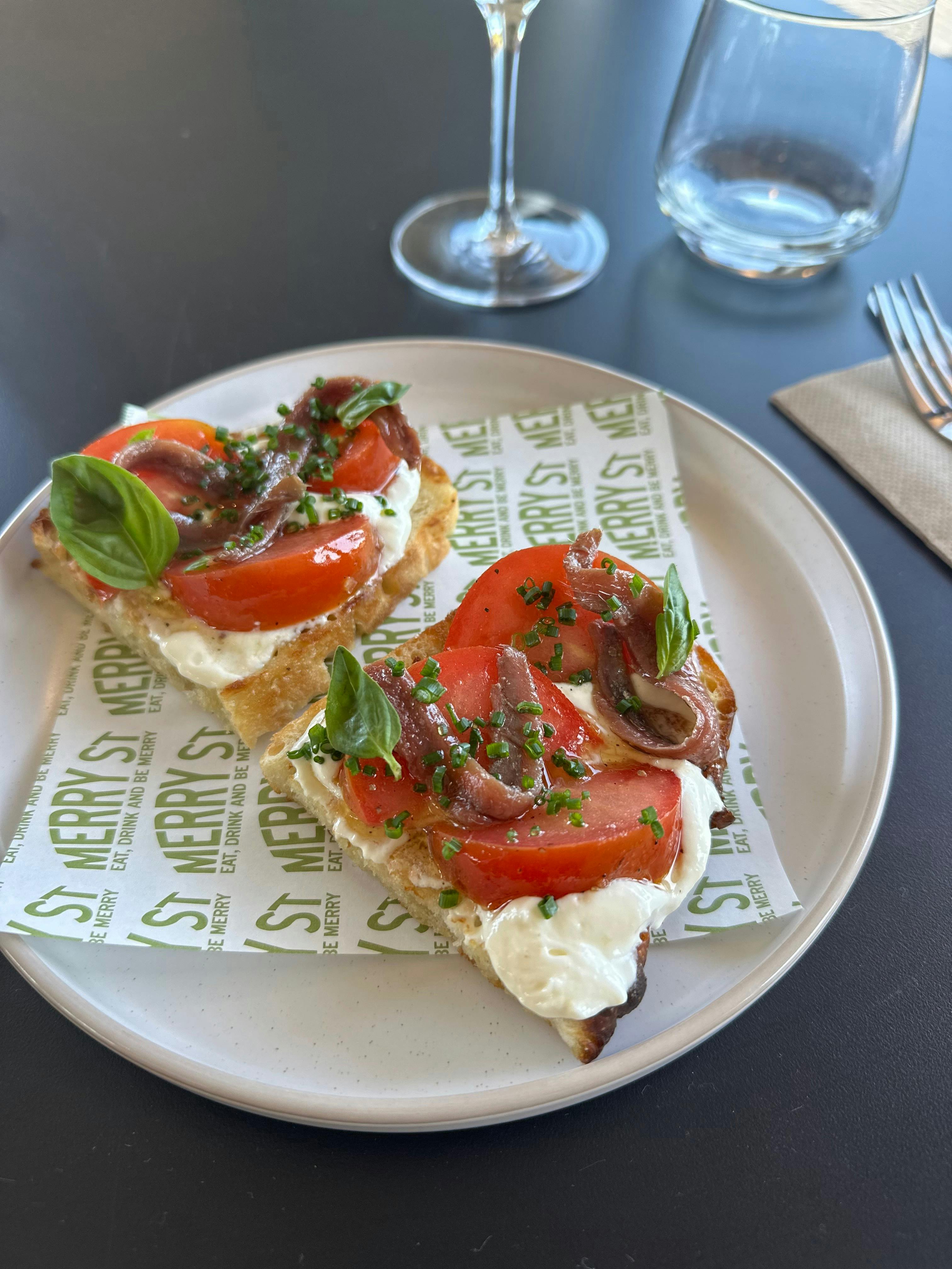 Tomato toast w/ Ortiz Anchovy