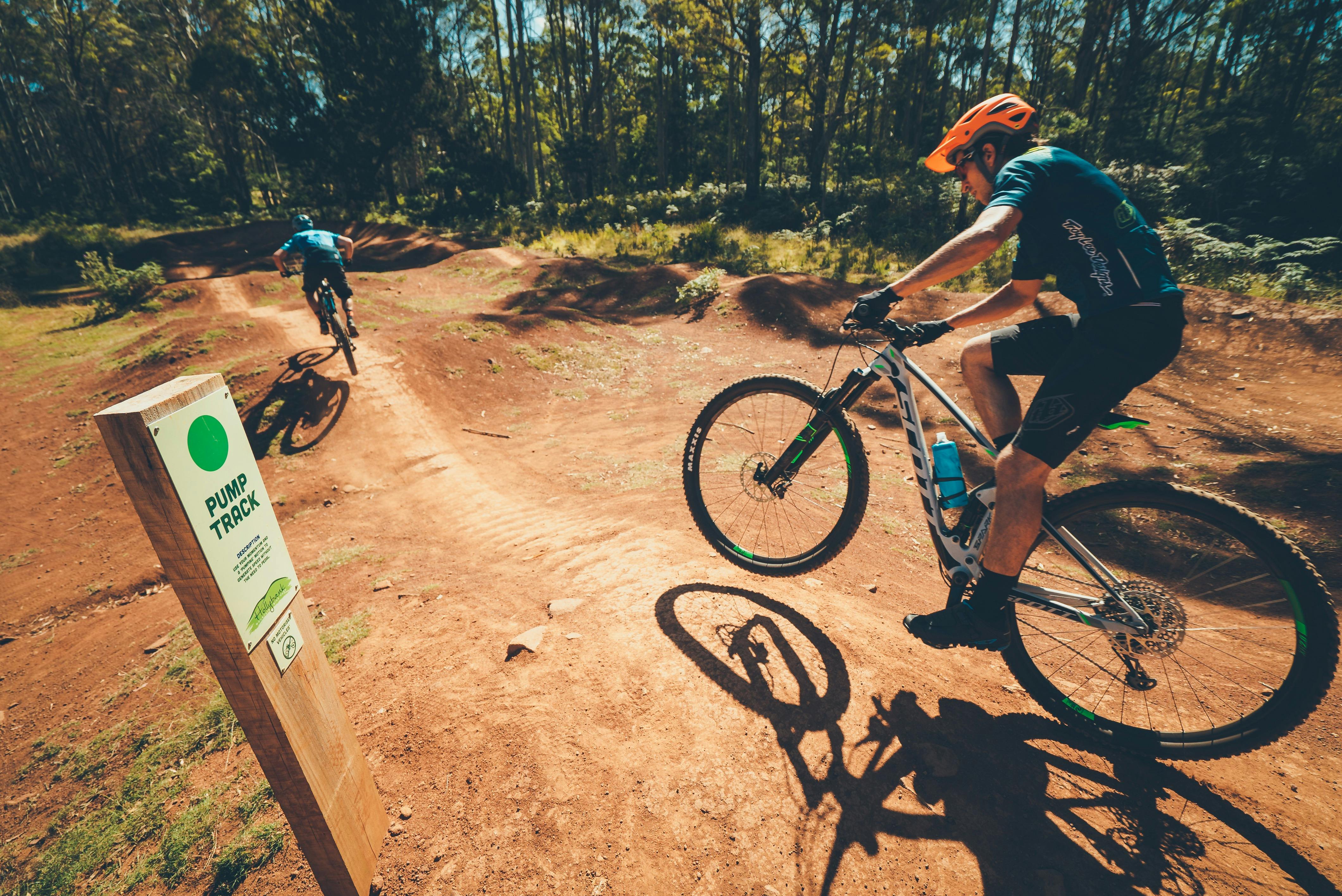 men riding mountain bikes