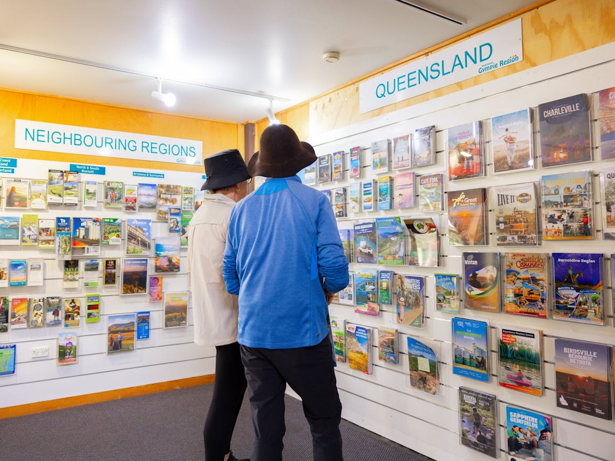 A couple looking at the information wall