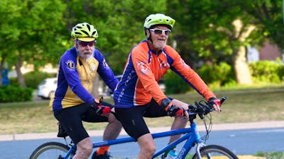 Two men on a tandem