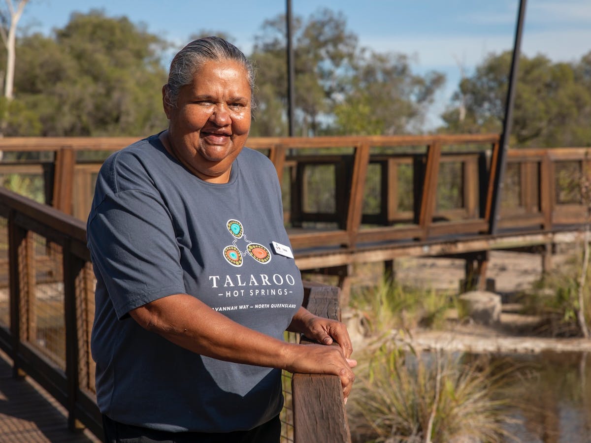 Ewamian tour guide overlooking Talaroo Hot Springs boardwalk