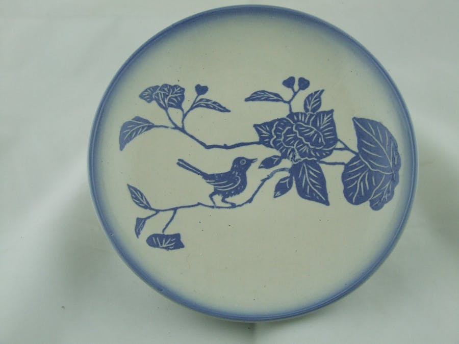 Platter with water-etched bluebird design