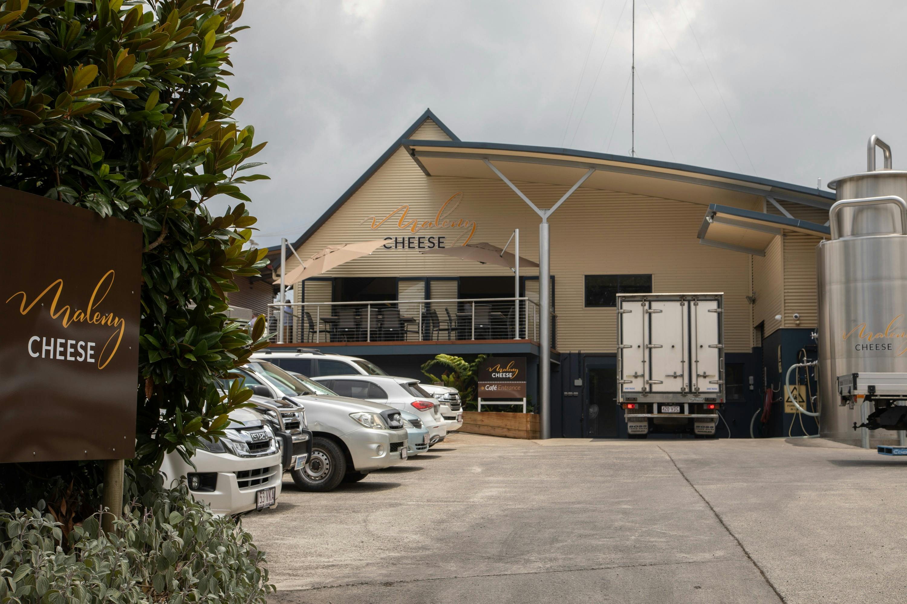 Carpark and cafe deck visible from the entrance