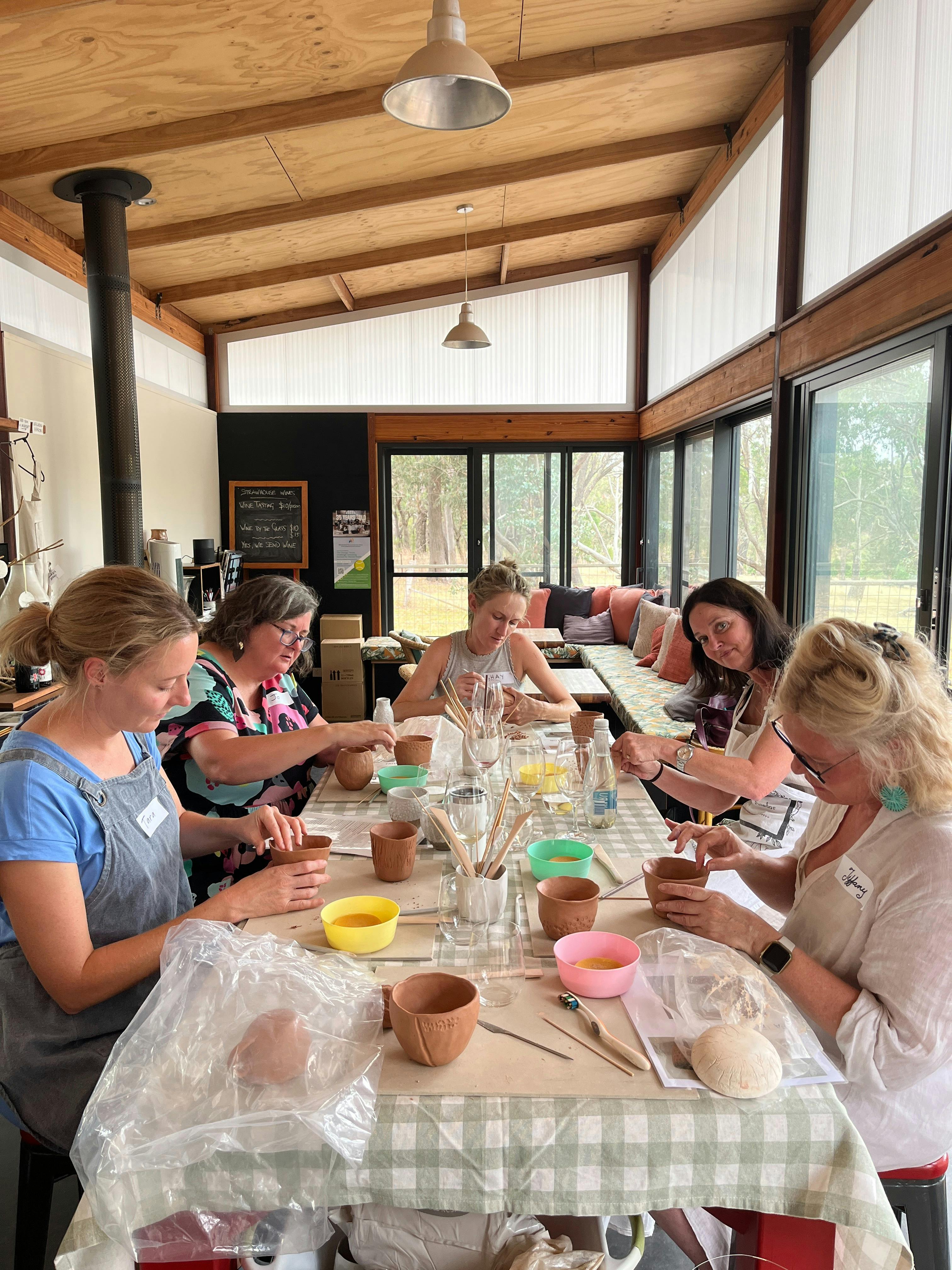 People enjoying pinching cups at a Byrnt Ceramics workshop