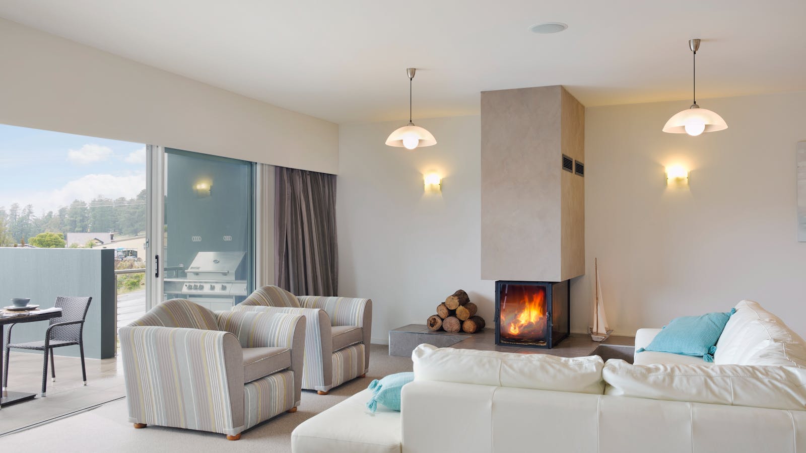 Our spectacular guest lounge and dining - accessible anytime. Light the fire and take in the view.